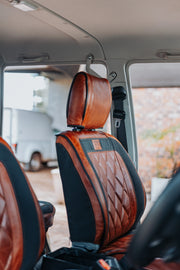 Beesdam Legacy Pro seat cover in charcoal canvas with toffee tan leather trim fitted in a Toyota Land Cruiser 79